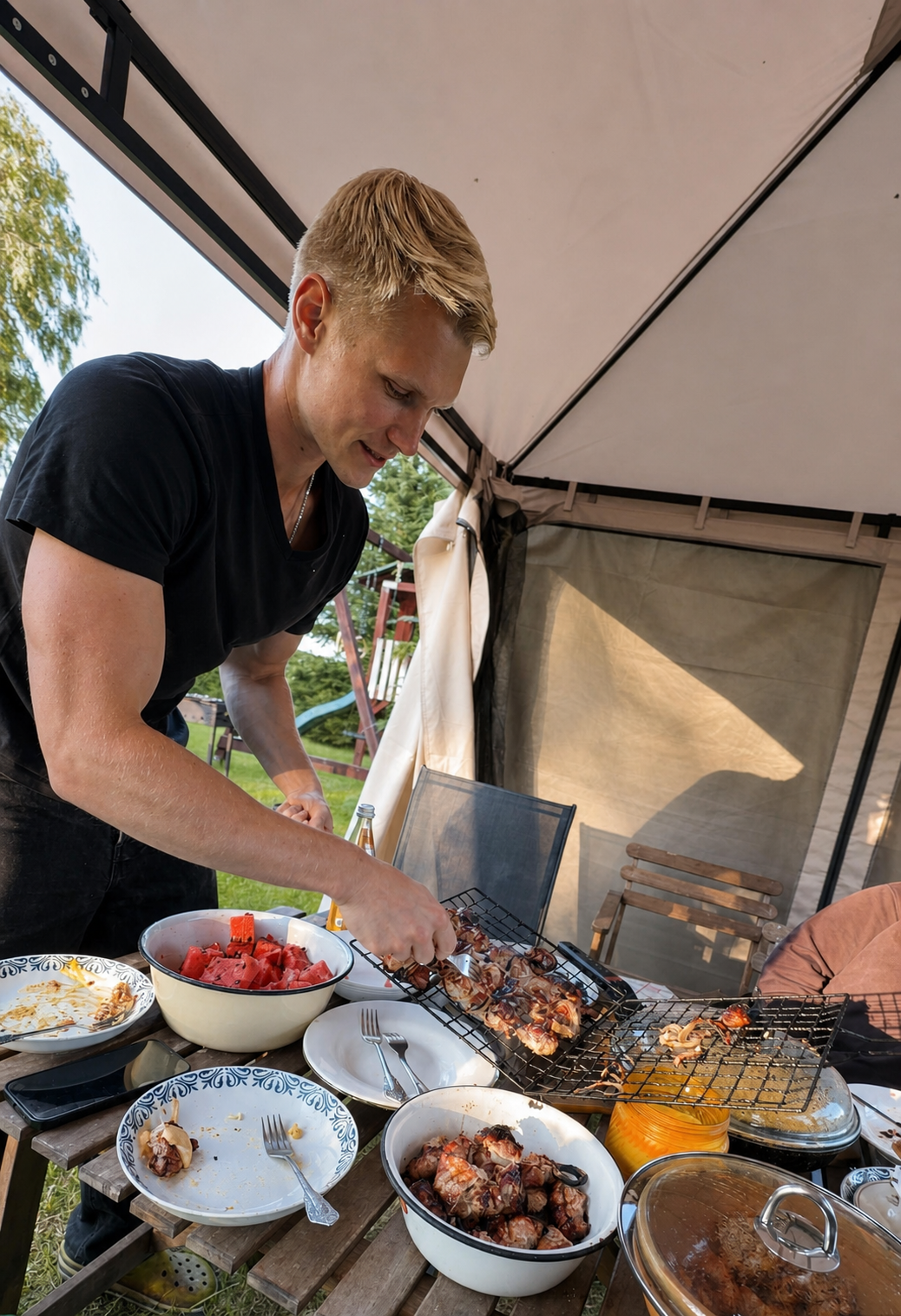 KarlisPTS preparing a protein-focused meal outdoors